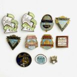 Early Butlins Badges (x10) and a Gold 15 Year Service Badge. A collection of 10 Butlins badges