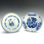 Two Delft blue and white plates, 18th century, each floral decorated, diameter 27cm.Provenance: