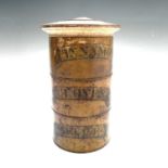 A treen three section spice tower, 19th century, the labels inscribed Cinnamon, Cloves and Mace,