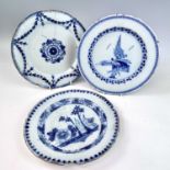 Three English Delft blue and white plates, 18th century, largest 22.5cm.Provenance: Michael