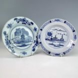 An English Delft blue and white plate, 18th century, decorated with a river scene, diameter 23cm and
