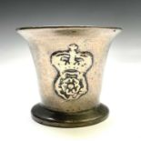 An English bronze mortar, probably 16th century, cast with the Tudor rose surmounted by a crown,