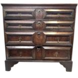 An 18th century oak chest of drawers, with four long drawers on bracket feet, height 86cm, width