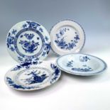 Three English Delft plates and a bowl, 18th century, largest diameter 24cm.Provenance: Michael