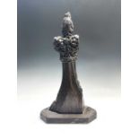 A carved oak poppy head bench end finial, 16th century, probably Devon, height 64cm, width 36cm,