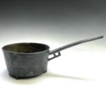 An 18th century bronze skillet, height of pan 12.5cm, diameter 21.5cm, length of handle 24cm.