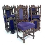 A set of seven Victorian carved oak dining chairs.