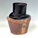 A Victorian top hat, labelled for D.Parsley, No 20, Clare Street, Bristol, in leather case,