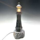 A Cornish turned serpentine lighthouse lamp, with glass canopy and of waisted form with rocky