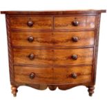 A Victorian mahogany chest of drawers with two short and three long drawers with half round twist