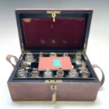 A Cox's home medicine chest, late Victorian, contained in a leather bound box containing fifteen