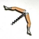 An early 20th century German novelty full flesh ladies legs folding corkscrew, worm head stamped