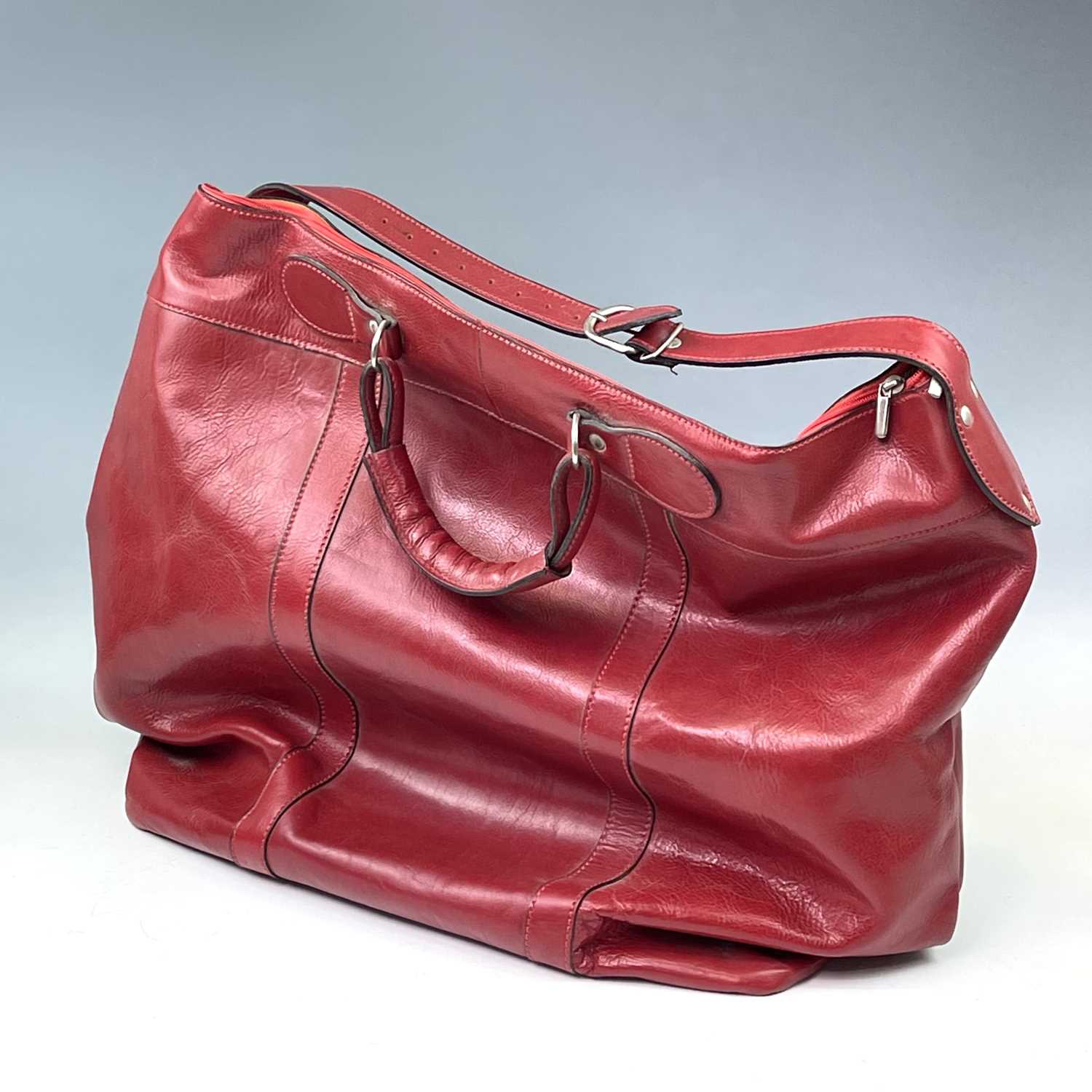 An oversized red leather bag with haymarket market check lining, height 50cmA small amount of - Image 6 of 7