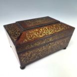 A Regency rosewood and cut brass inlaid workbox, labelled for Wilson & Co, Edinburgh, on ball