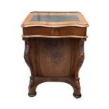 A Victorian walnut Davenport, with slope top and fitted interior with four real and four dummy