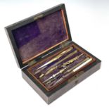 A Victorian set of rosewood cased drawing instruments, width 19cm.Lot 55Appears complete, with