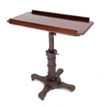 A 19th century mahogany adjustable reading stand by Carters of London with manufacturers label to