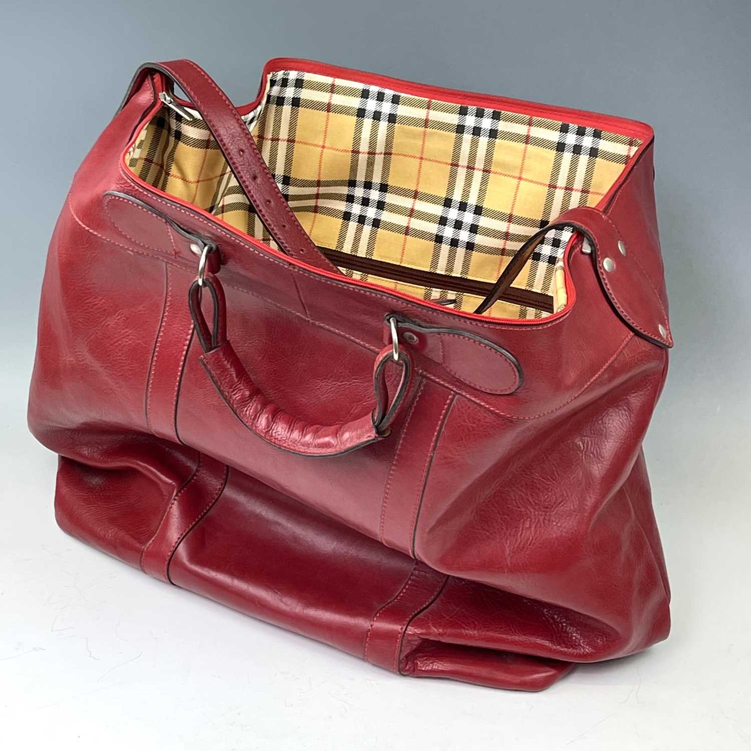 An oversized red leather bag with haymarket market check lining, height 50cmA small amount of - Image 4 of 7