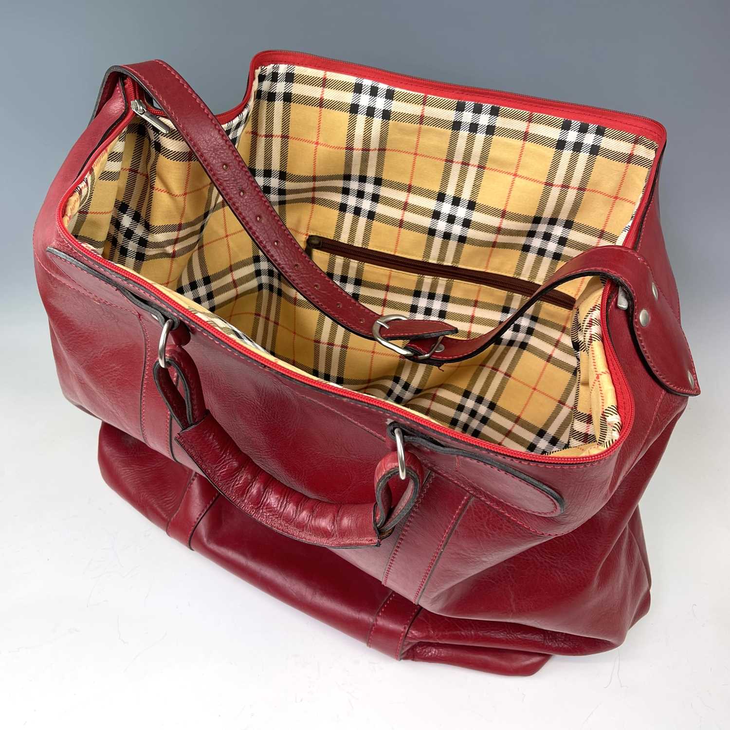 An oversized red leather bag with haymarket market check lining, height 50cmA small amount of - Image 2 of 7