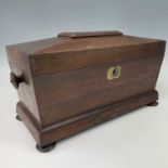 A William IV rosewood sarcophagus shape tea caddy, with original glass bowl and twin lidded