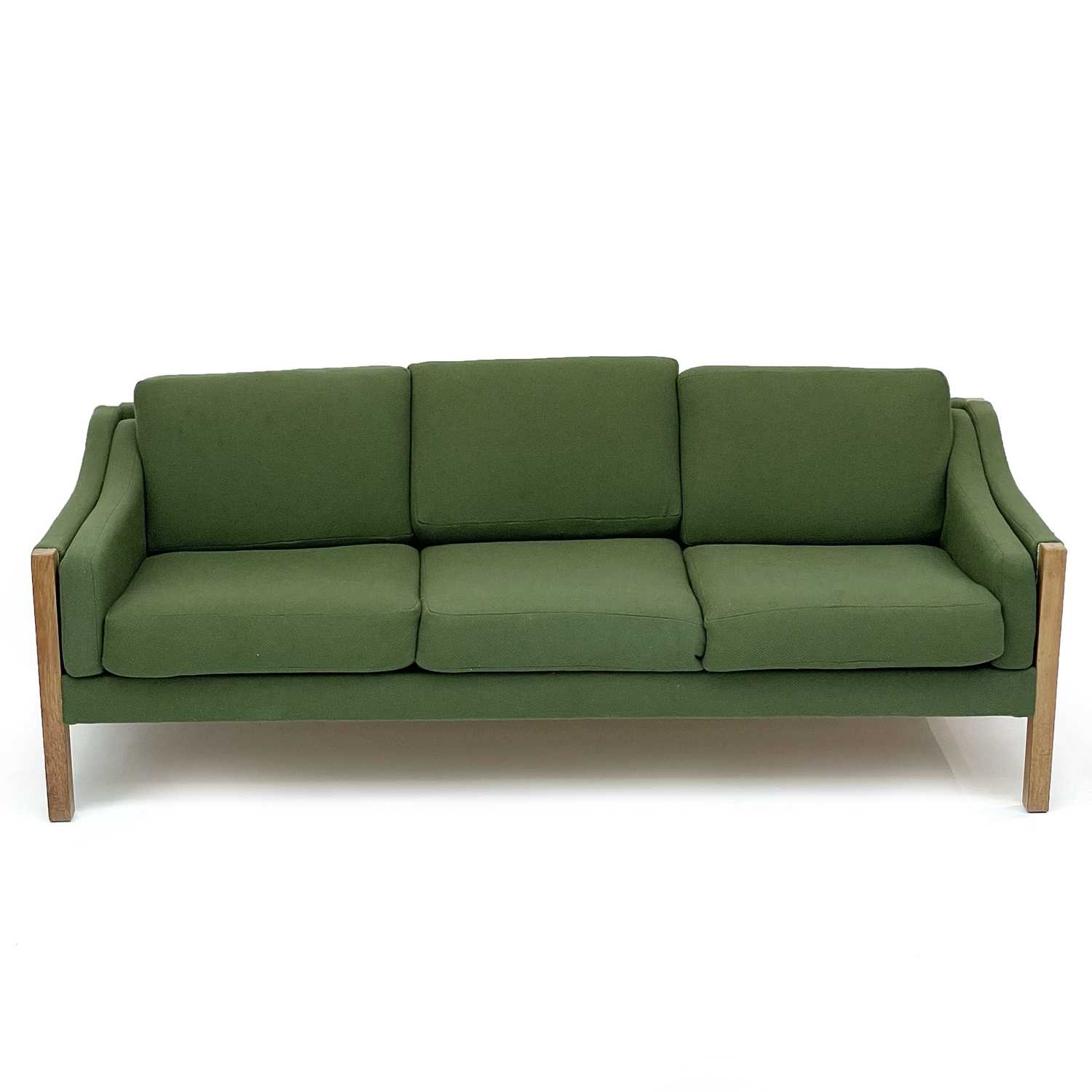 A Danish oak mid century three-seater settee, raised on square supports, height 62cm, width 188cm,