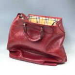 An oversized red leather bag with haymarket market check lining, height 50cmA small amount of
