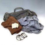 A WWII era kit bag with brass clips together with a canvas bag, a women's RAF dress from the same