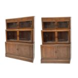 A pair of oak sectional bookcases, the 1930s, each with Odeonesque moulded frieze above two pairs of