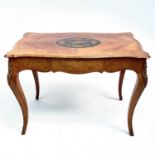 A Late Victorian walnut marquetry and brass mounted shaped table, the inlaid central decoration of