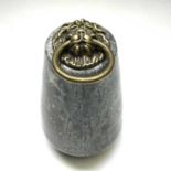 A Cornish serpentine doorstop, of turned, tapered form, with brass lion mask handle, height 22cm.Lot