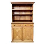 An Edwardian satinwood two-part bookcase, possibly originally from a ship, the open upper part