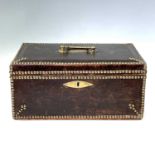 A 19th century studded leather desk and dressing box by William Eyre, makers label to inside of