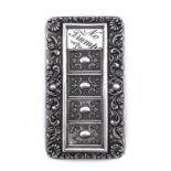 An Edwardian silver mounted Trumps card suite marker by George Houston, with foliate scroll embossed