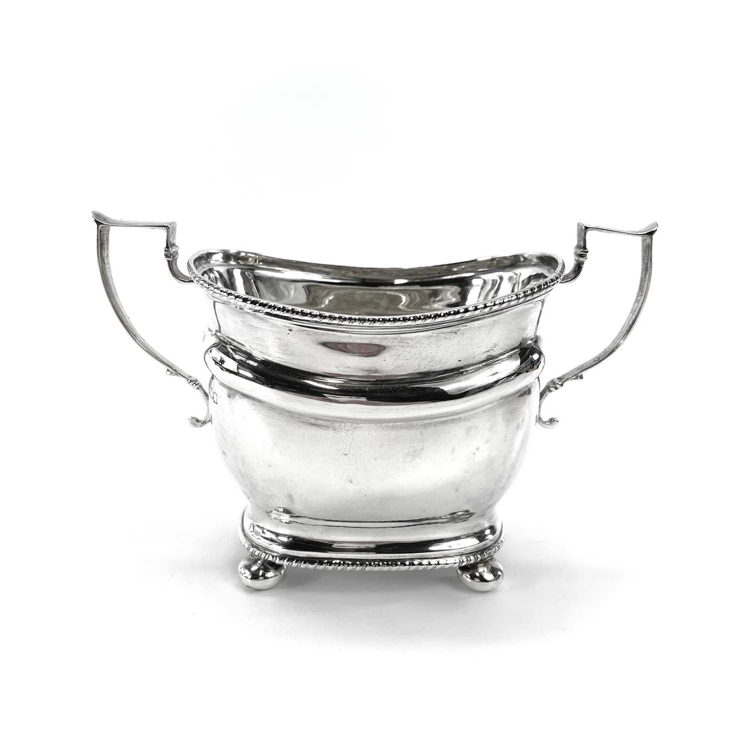 A George V silver three piece tea set by Thomas Bradbury & Sons Ltd, of oblong form with gadrooned - Image 2 of 10