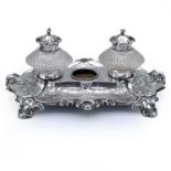 A good Victorian silver three section desk stand by Thomas Bradbury & Sons, of oblong form with