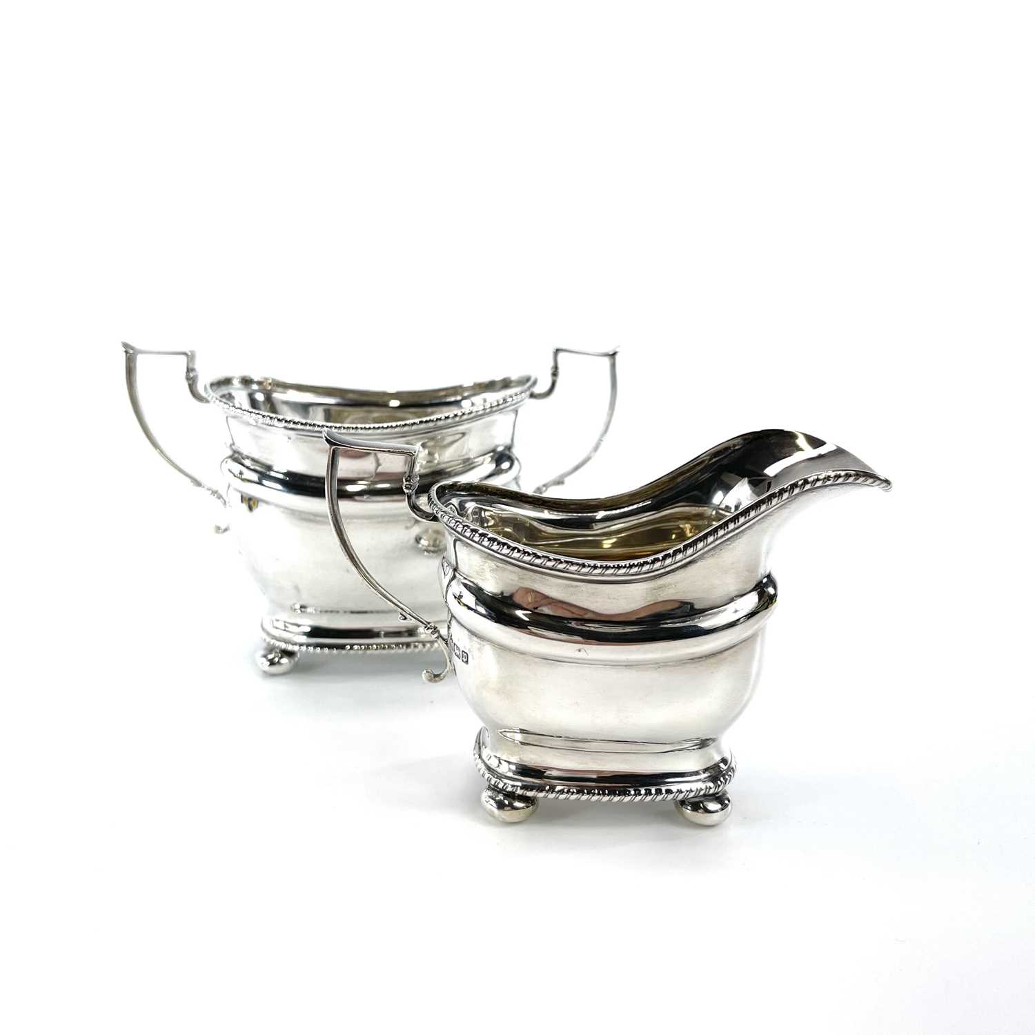 A George V silver three piece tea set by Thomas Bradbury & Sons Ltd, of oblong form with gadrooned - Image 8 of 10