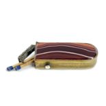 A banded agate and brass vesta case with hinged lid, length 7cm.