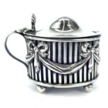 A Victorian silver mustard pot by William Hutton & Sons Ltd, of oval section with hinged lid and