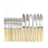 An Edwardian silver and ivory fish knife and fork set for six, Sheffield 1908, weight 600g.***This