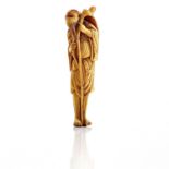 An 18th century carved ivory Kyoto school netsuke of a standing sage with staff, height 9.5cm.***