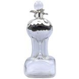 An Edwardian silver mounted pinched glass decanter and stopper by William Hutton & Sons,