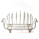 A good Victorian silver graduated six section toast rack by Atkin Bros., with twin scroll handles