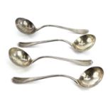 A rare set of four Georgian silver Hanoverian pattern sauce ladles, indistinct marks, the handle