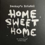 Two books. 'Banksy. Wall and Piece'. Banksy. Published 2006 The Random House Group Limited. '