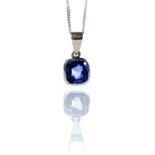 A platinum sapphire set pendant, the square cushion Sri Lankan sapphire measuring 2ct approximately,