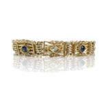 An attractive Victorian 15ct gold diamond and sapphire set six stone gatelink bracelet, the panels