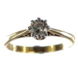 An 18ct and platinum diamond solitaire ring, the claw set diamond measuring 0.25ct, size Q, weight