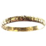 An early Victorian 18ct hallmarked gold band ring with engraved decoration, London 1845, size J/K,