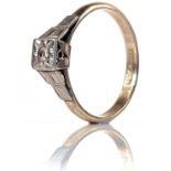A 9ct and platinum single small diamond set ring, size O, weight 2.15g.