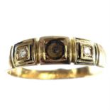 A Victorian 18ct gold ring set with two small diamonds, the central stone missing, engraved